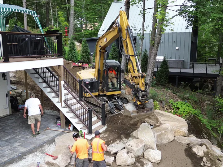 Drone view of crew working next to a deck stairway