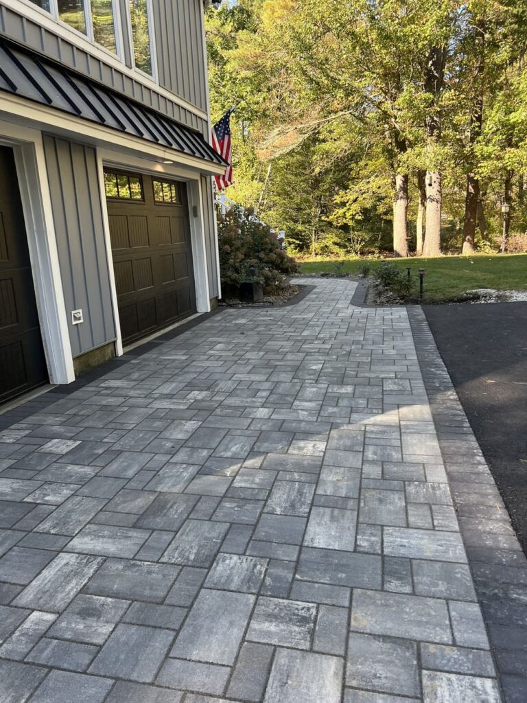Rock wall and patio under construction in New England.